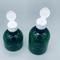 สีเขียวเข้มที่ว่างเปล่าขายส่ง 50ml 100ml 150ml ขวดแชมพูแบบกำหนดเองกลม PET เครื่องสำอางขวดพลาสติกปั๊ม
